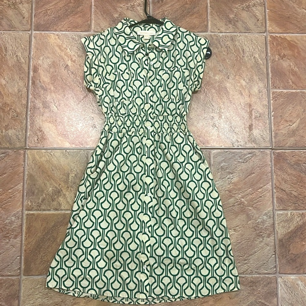 This is cute white with green pattern dress.